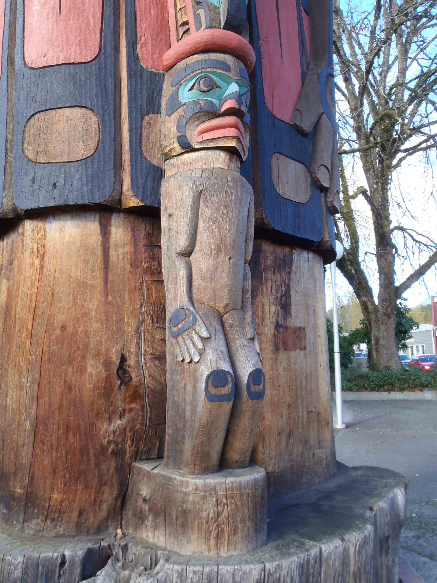 Cedar Man Walking Out of the Log, totem pole, Duncan, B.C. Man figure