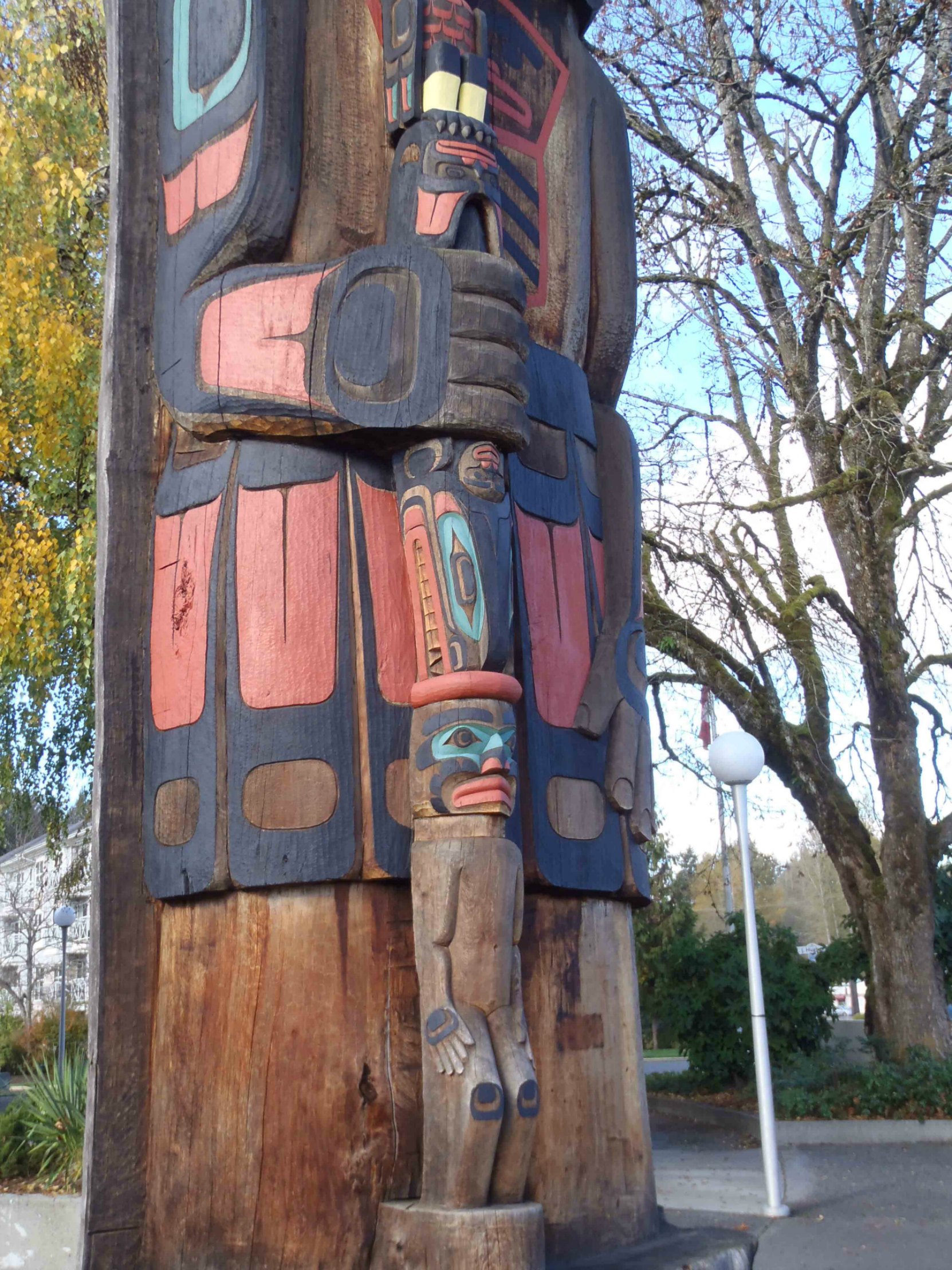 Cedar Man Walking Out of the Log, totem pole, Duncan, B.C.
