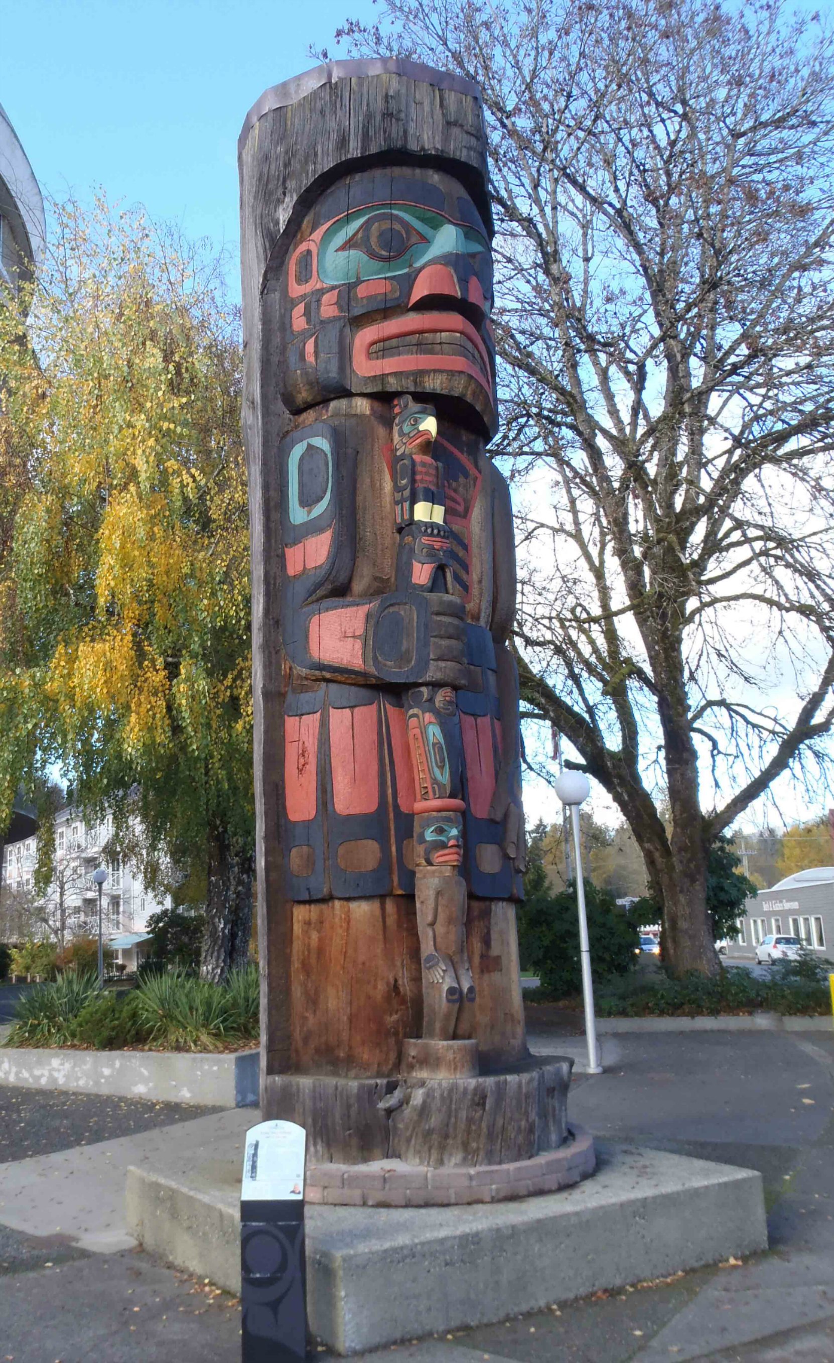 Cedar Man Walking Out of the Log, totem pole, Duncan, B.C.