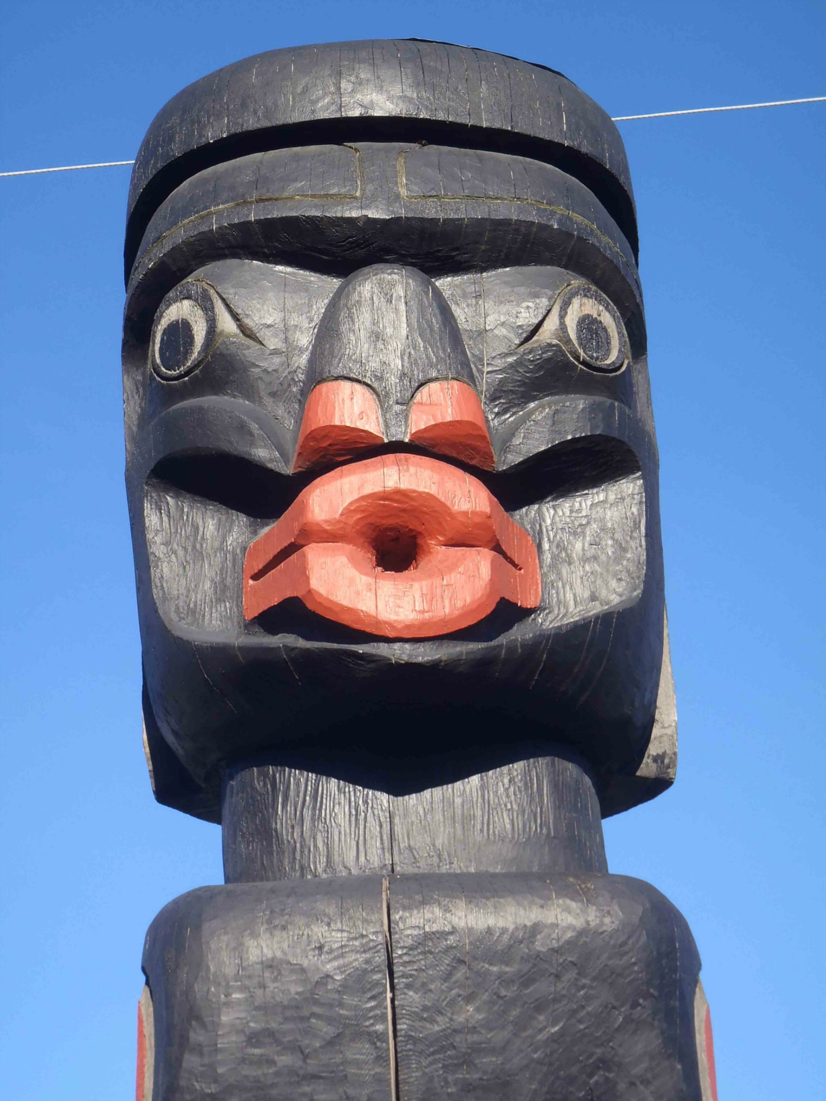 Dzunuk'wa pole, Wild Woman figure, face detail, Government Street at Kenneth Street, Duncan, B.C.
