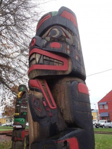 Kwagu'l Bear Holding A Seal - Frog, Bear and Frog figures - Charles Hoey Park, Canada Avenue, Duncan, B.C.