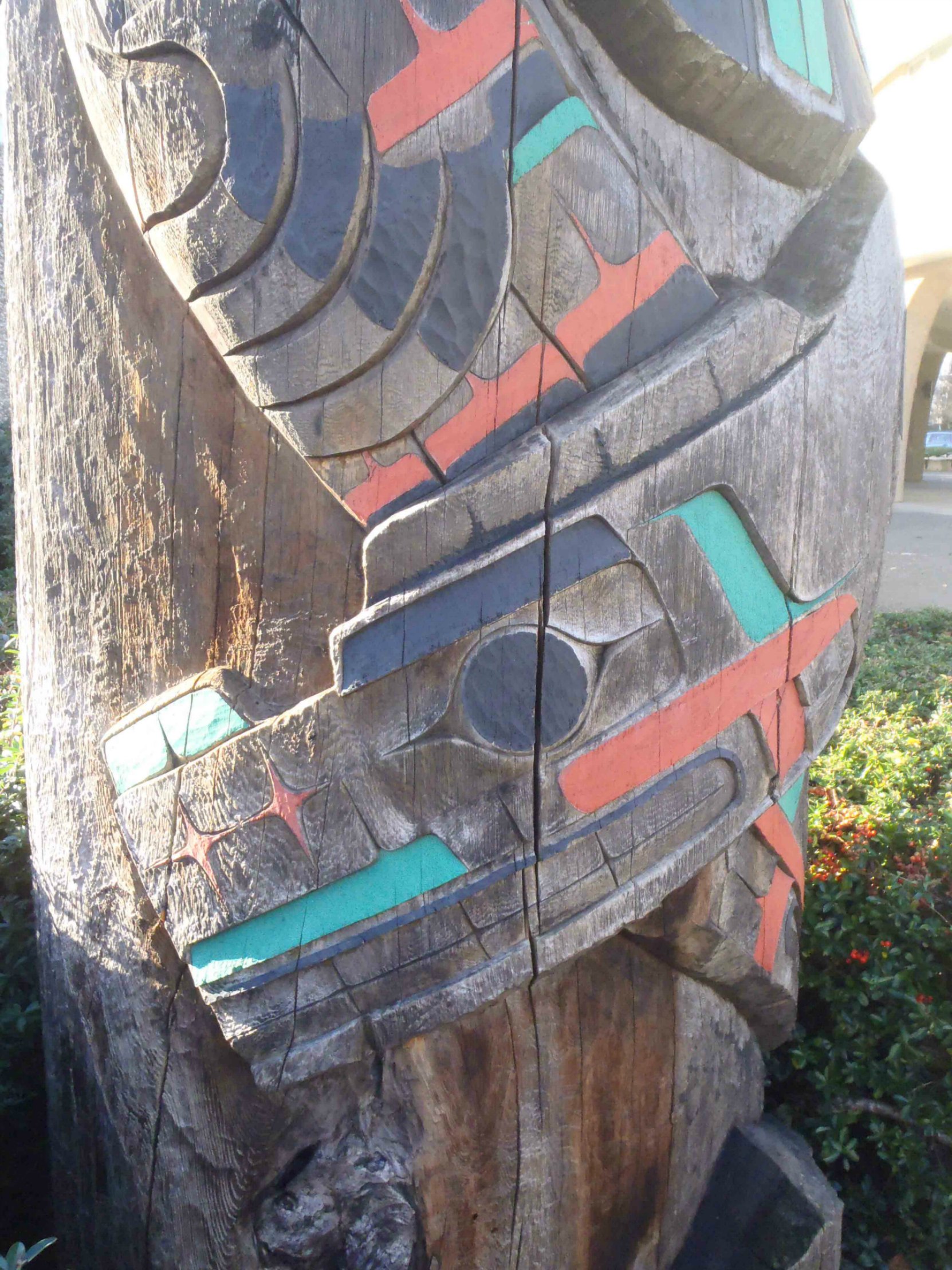 Peaceful Boundaries pole, Sea Serpent figure detail, outside Provincial Courthouse, Government Street, Duncan, B.C.