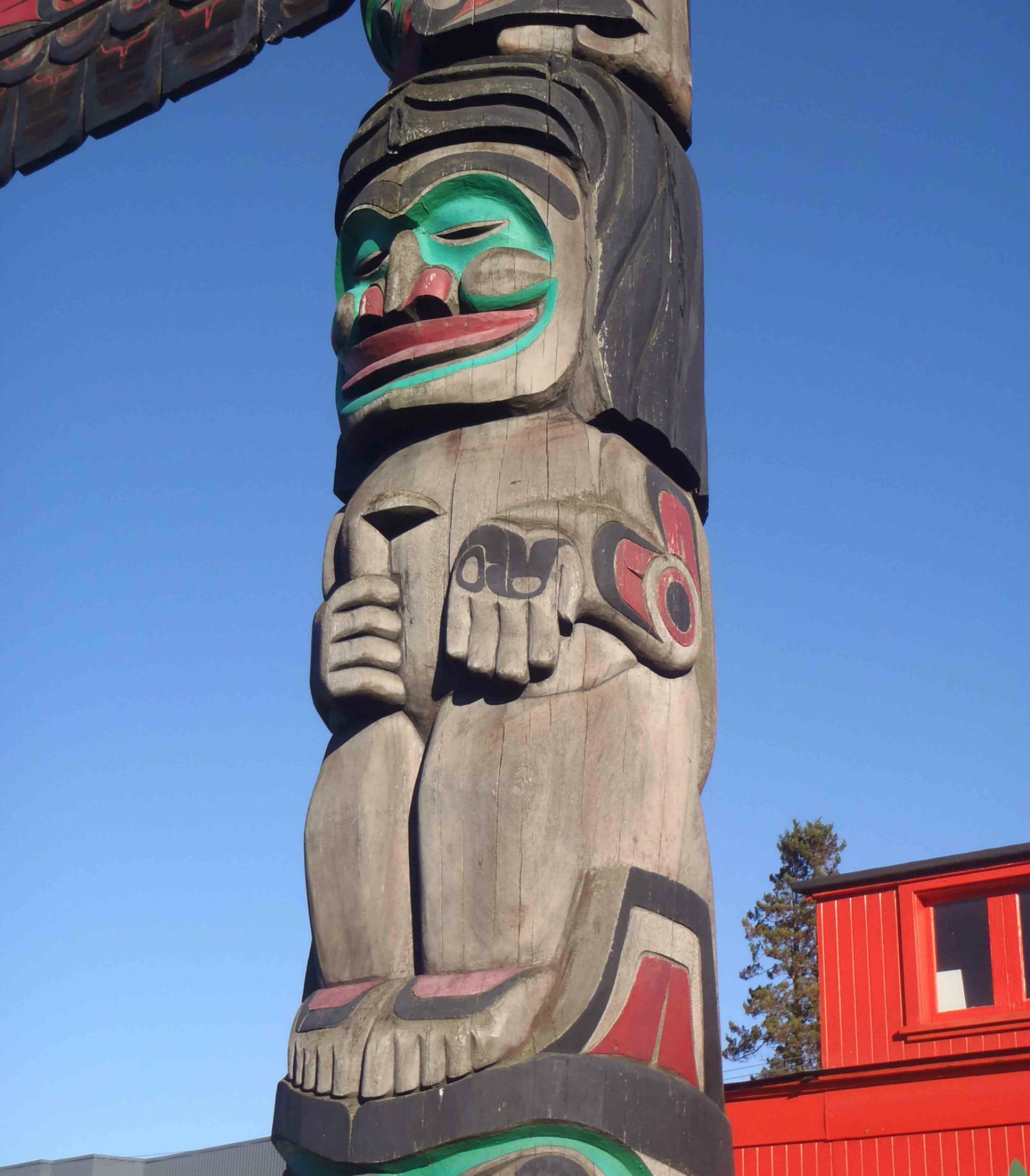Raven's Gift totem pole, Man figure, Canada Avenue, Duncan, B.C.