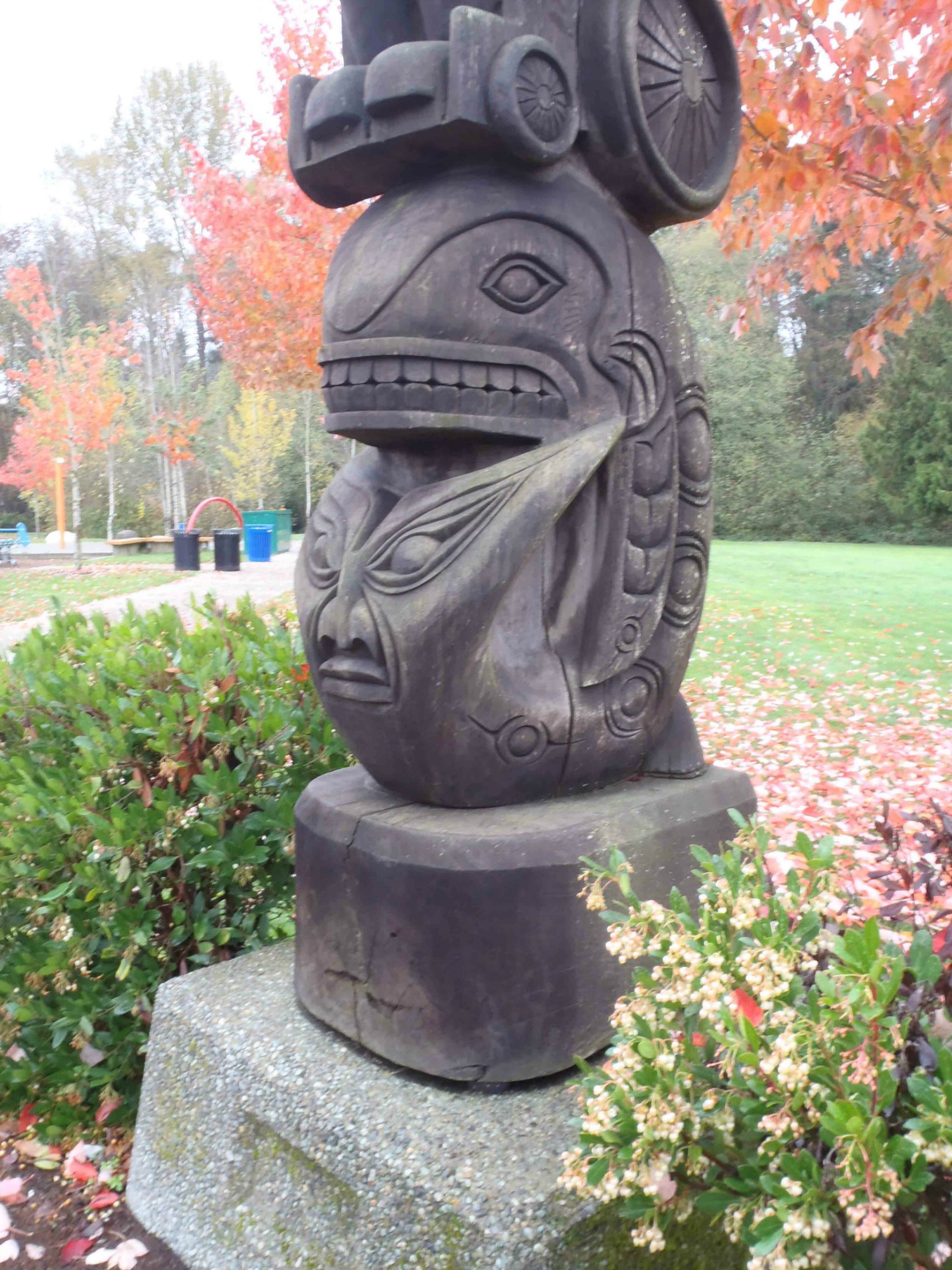 Rick Hansen Man In Motion totem pole, Centennial Park, Duncan, B.C., Killer Whale and Wolf figures