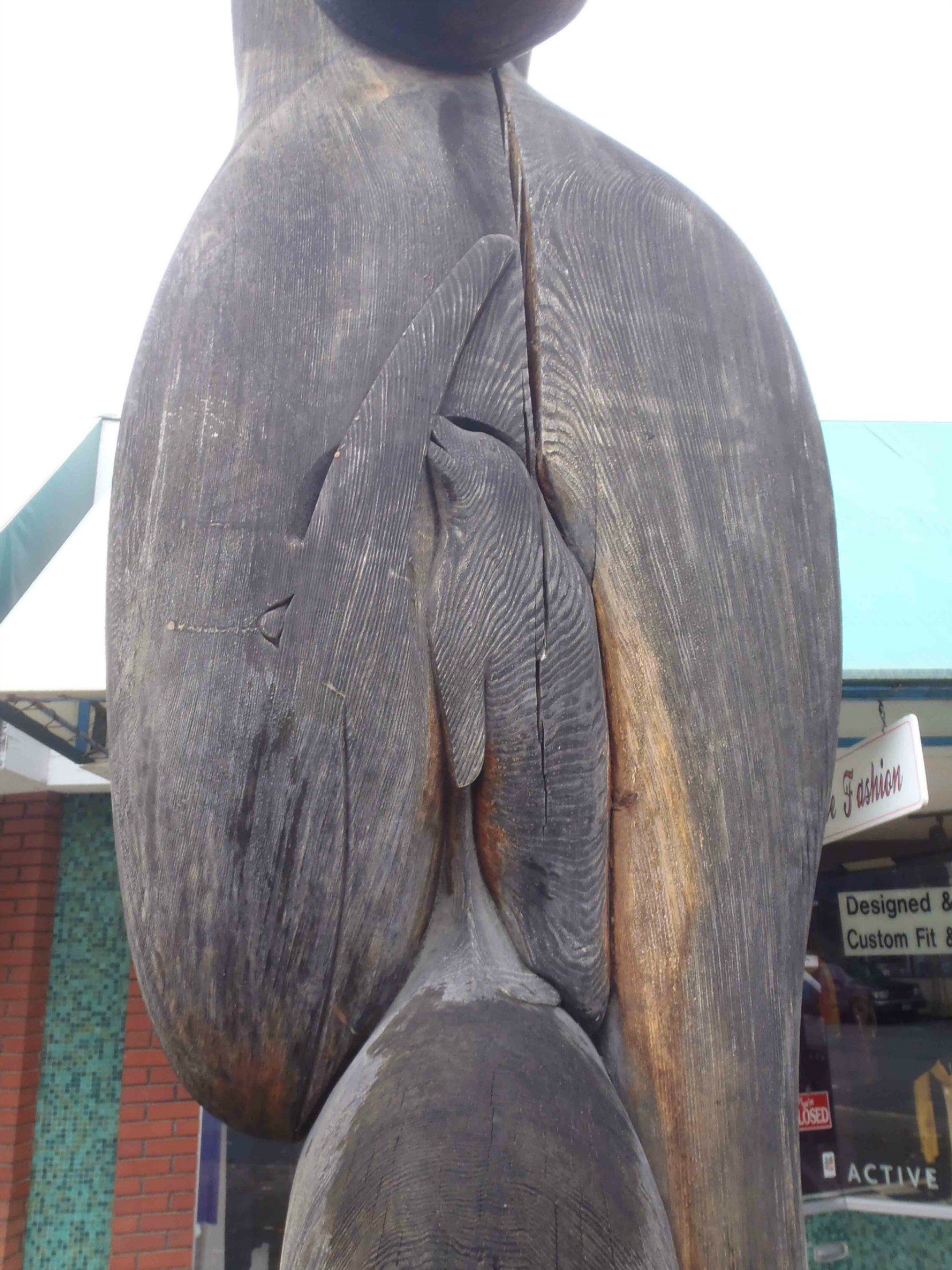 Transition totem pole, Killer Whale mother and Seal figures, Station Street, Duncan, B.C.