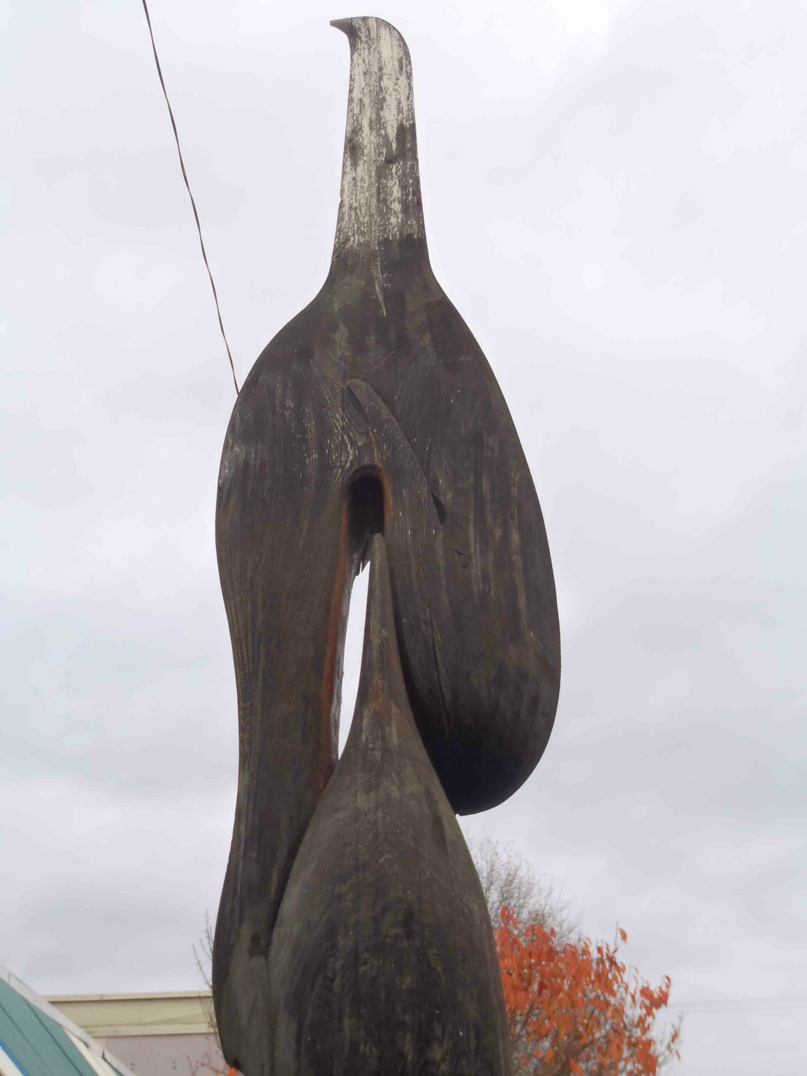 Transition totem pole, Killer Whale father figure, Station Street, Duncan, B.C.