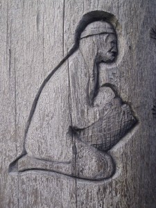 Cedar Woman and Man totem pole, carving detail