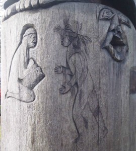 Cedar Woman and Man totem pole, carving detail