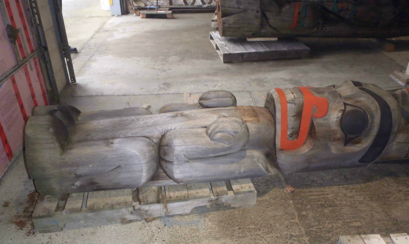 Eagle Raven Bear totem pole, Bear figure, during maintenance, 2016.