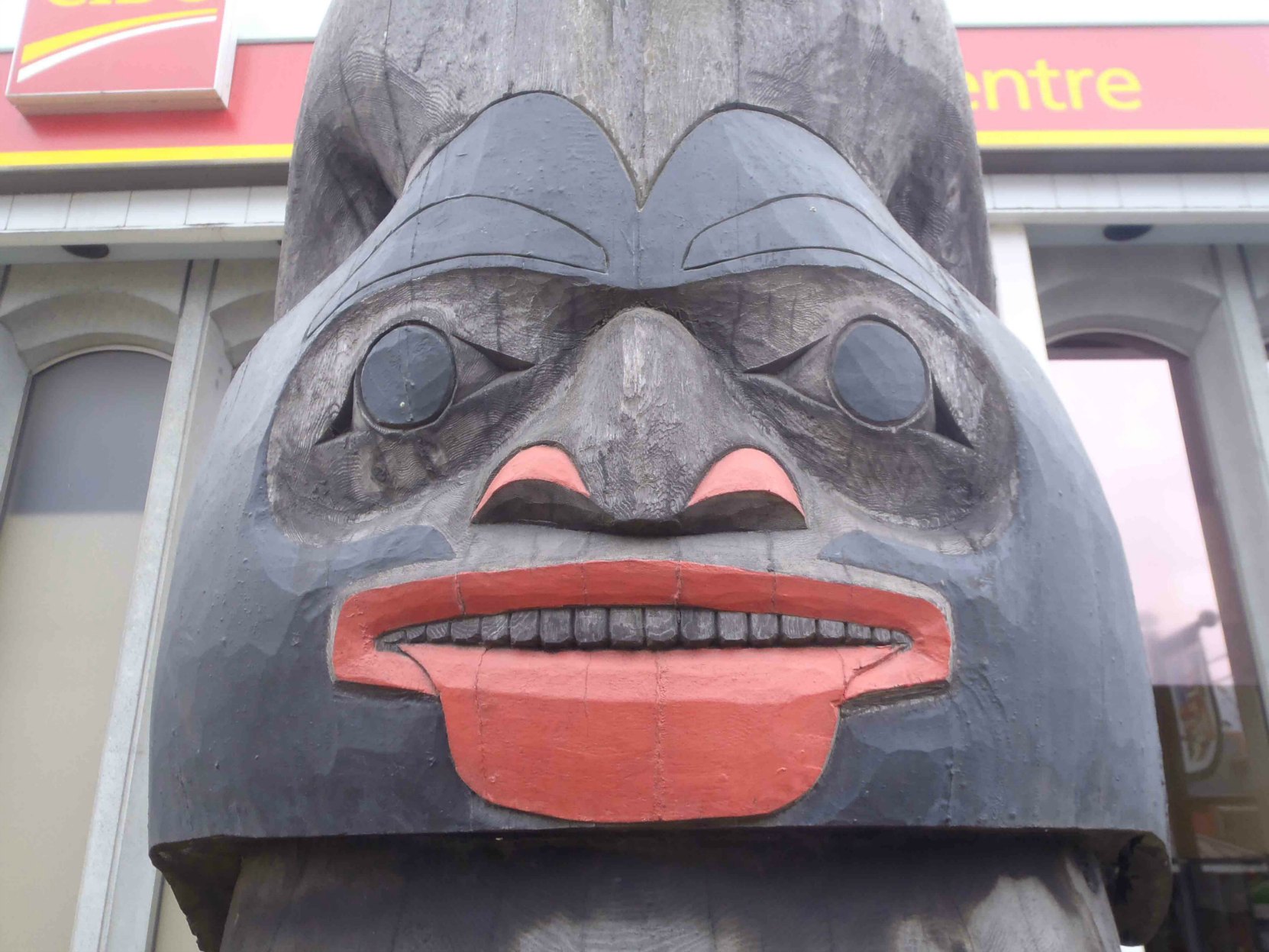 Harvest Time totem pole, North Wind figure, Station Street and Craig Street, Duncan, B.C.