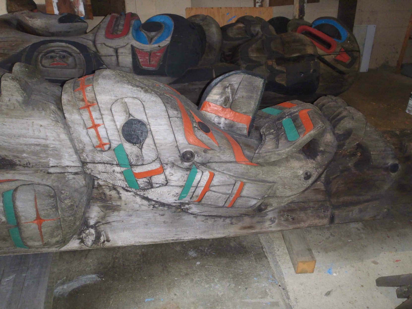 Pole of Wealth, Whale figure, during restoration, 2016