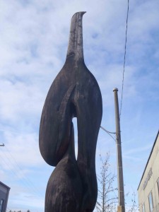 Transition totem pole, top Killer Whale figure, Station Street between Canada Avenue and Craig Street