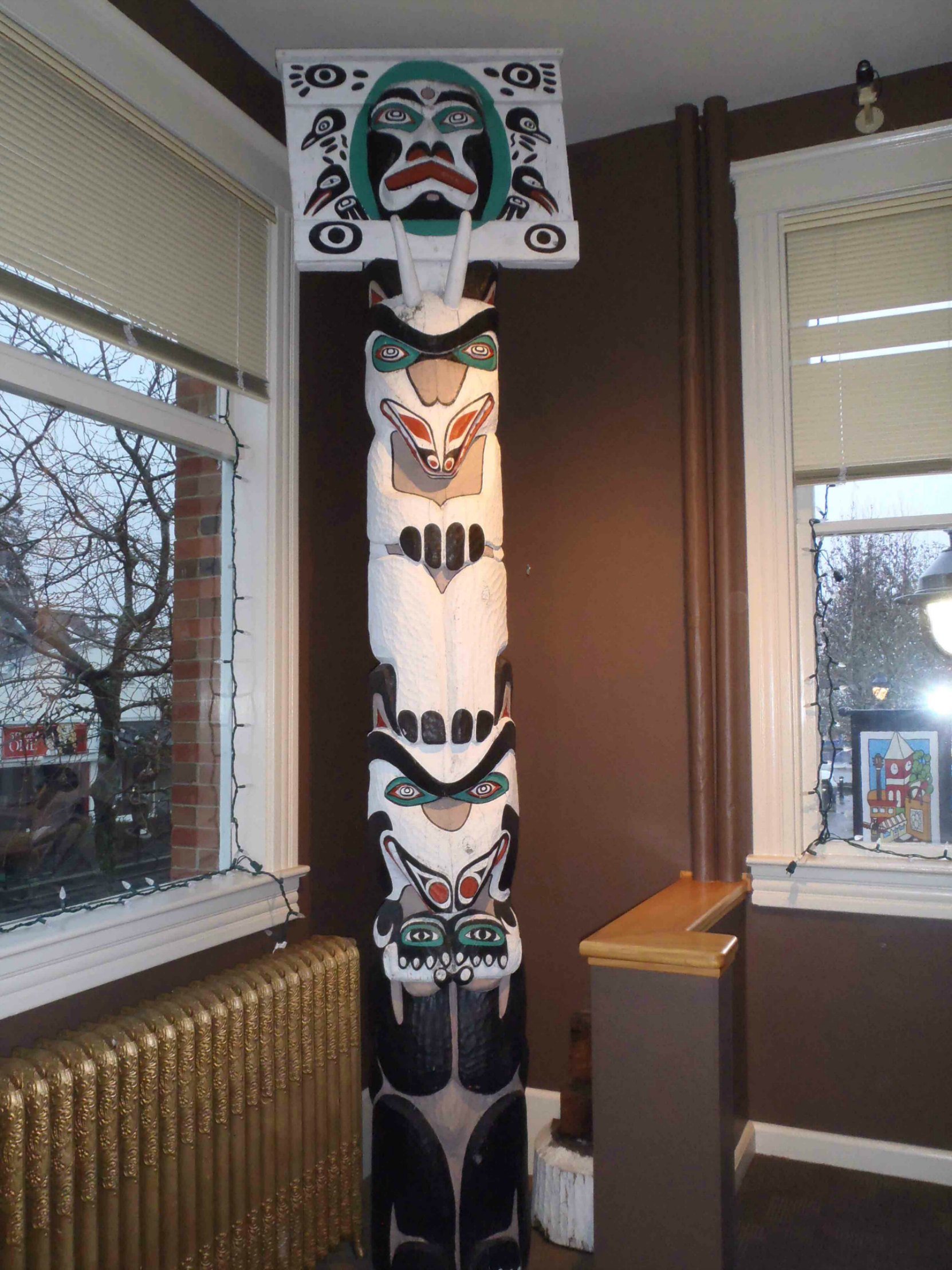 Mortuary Pole, carved by Simon Charlie, is displayed inside Duncan City Hall